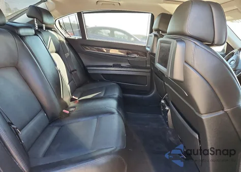 2011 BMW 750 Lxi z USA, uszkodzony, nr VIN WBAKC8C55BC431907